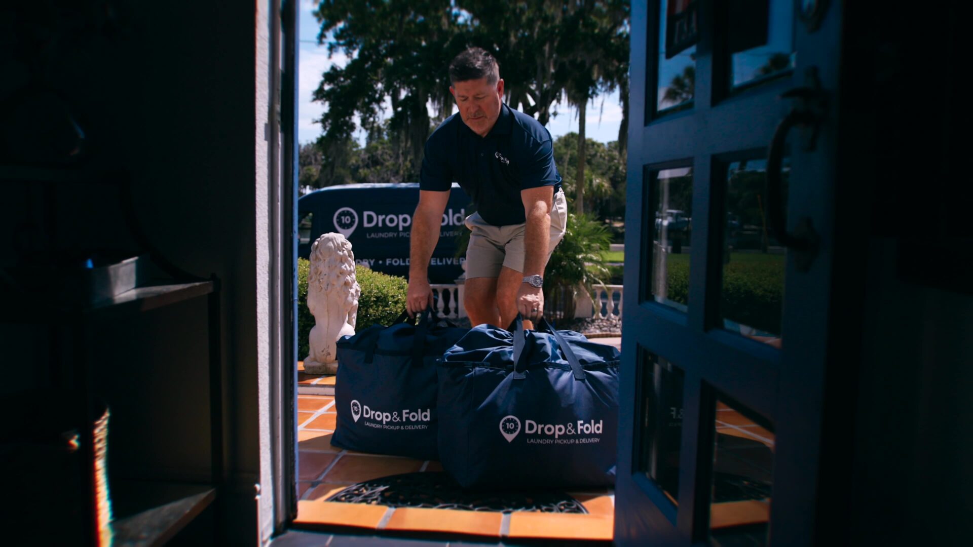 Freshly folded laundry bagged in a premium Drop & Fold Laundry bag